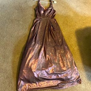 A Nadeshiko pink sparkly dress. Floor length. Thin straps. Formal